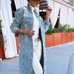 Medium wash distressed long denim jacket